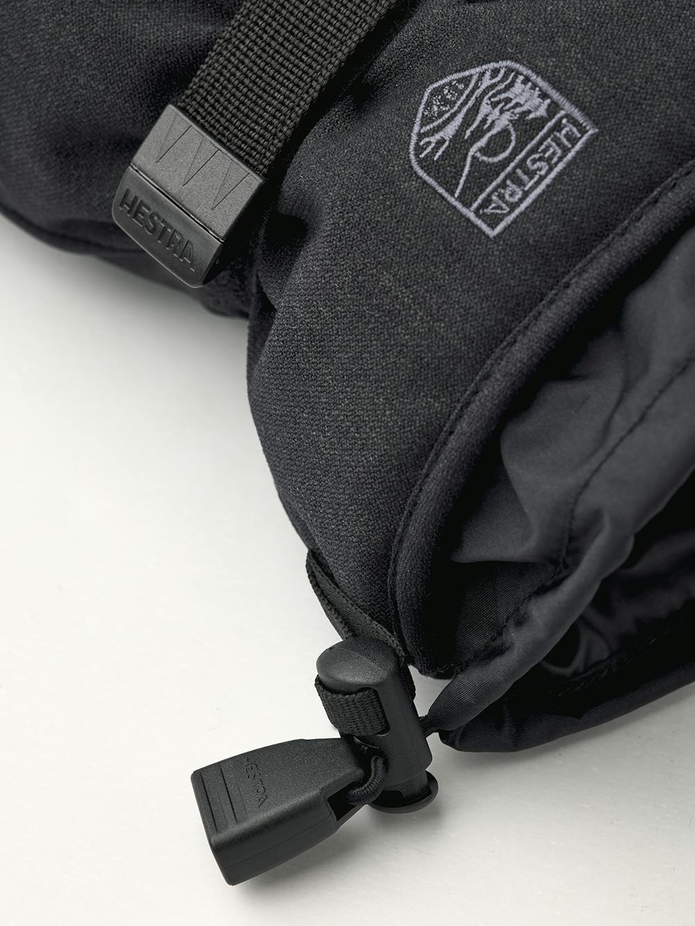 Schwarzer Fausthandschuh aus Stoff mit Synthetikmaterial an der Innenhand und verstellbarem Handgelenkverschluss (3 oder 5)