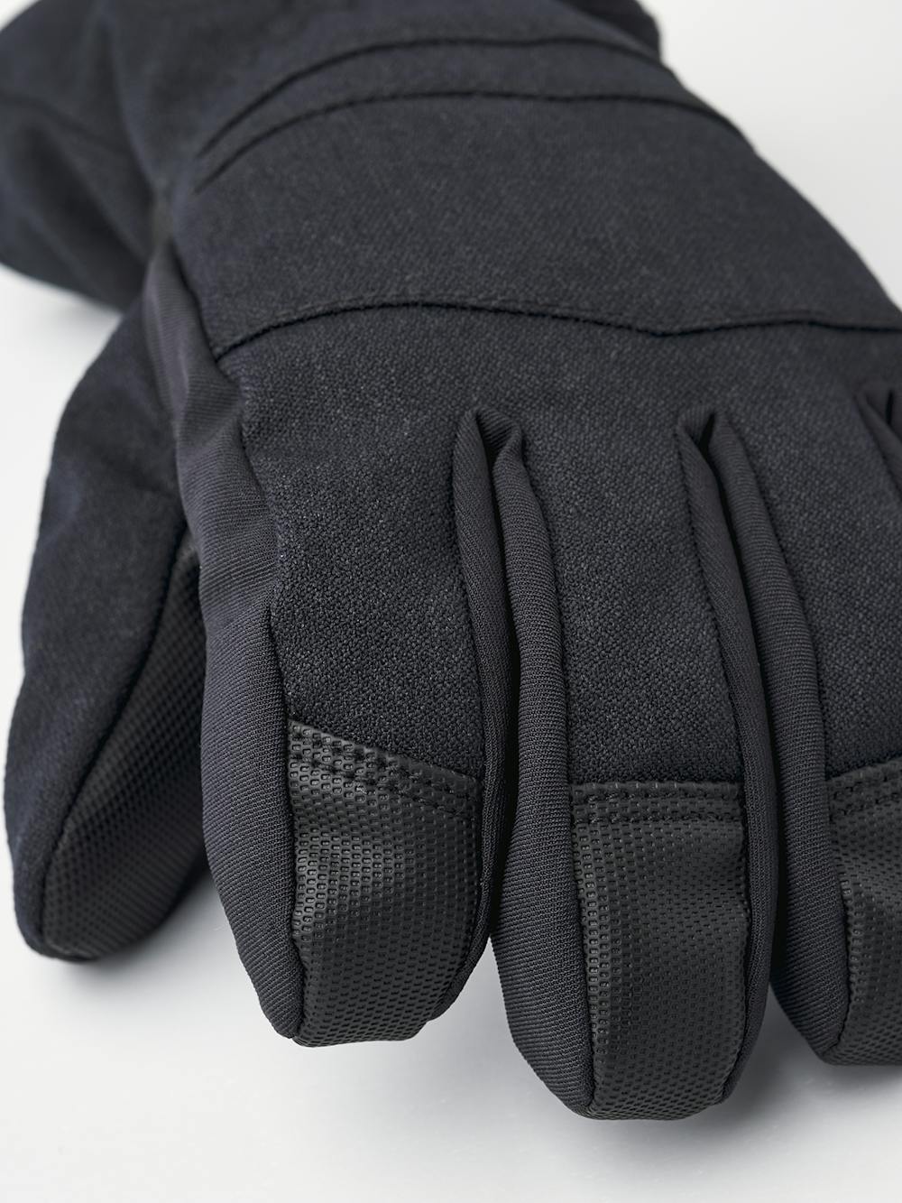 Black fabric children’s glove with black synthetic palm and wrist adjustment (2 of 3)