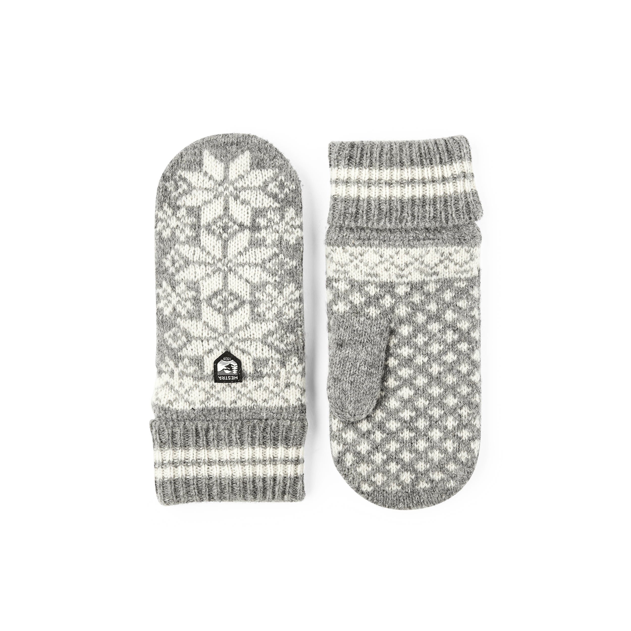 Grå stickad tumvante i ullmix med motiv
(1 av 4)