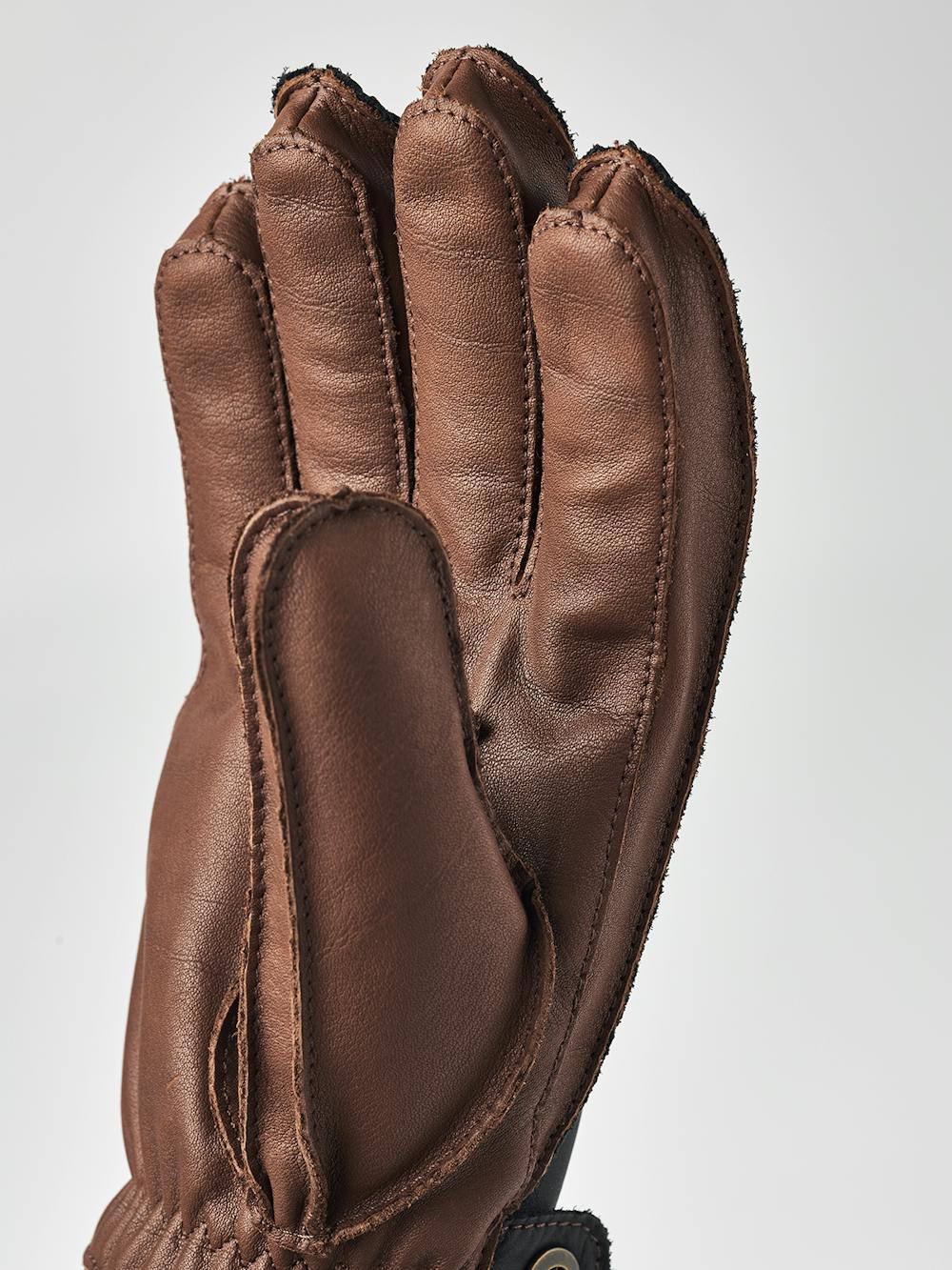 Dark blue cow hide ski glove with dark brown palm and wrist adjustment  (4 of 5)