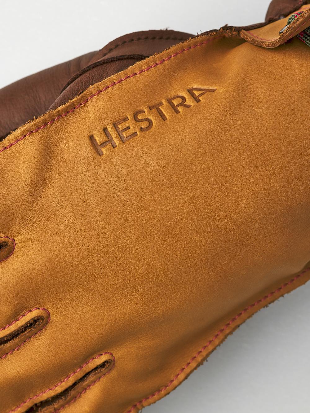 Light brown cow hide ski glove with brown palm and wrist adjustment (2 of 7)