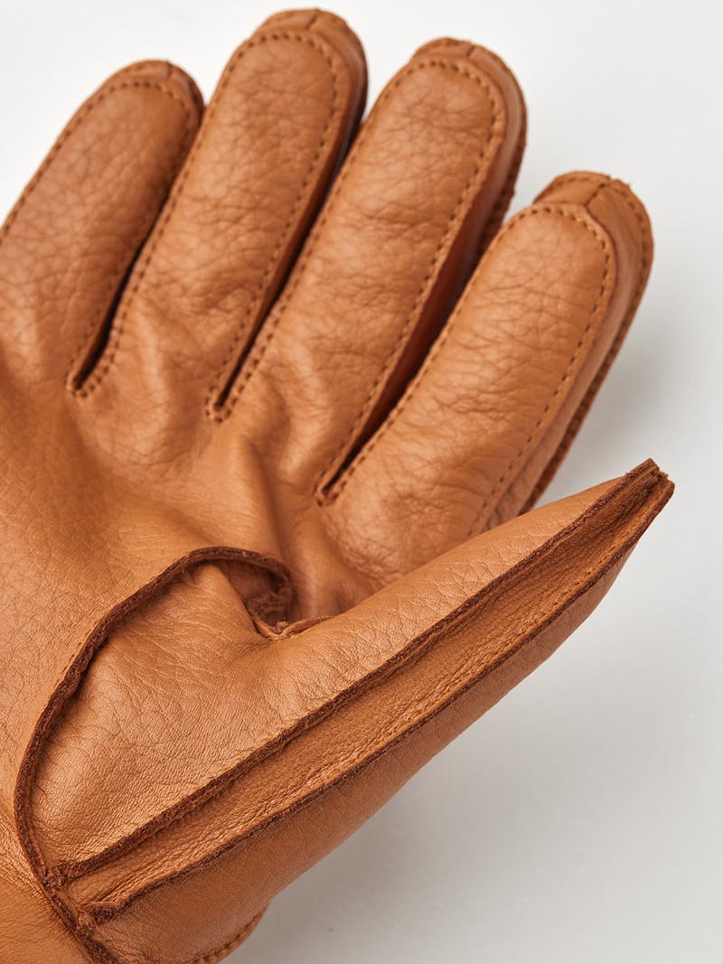 Light brown machine-sewn deerskin glove with beige knitted cuff
 (2 of 3)