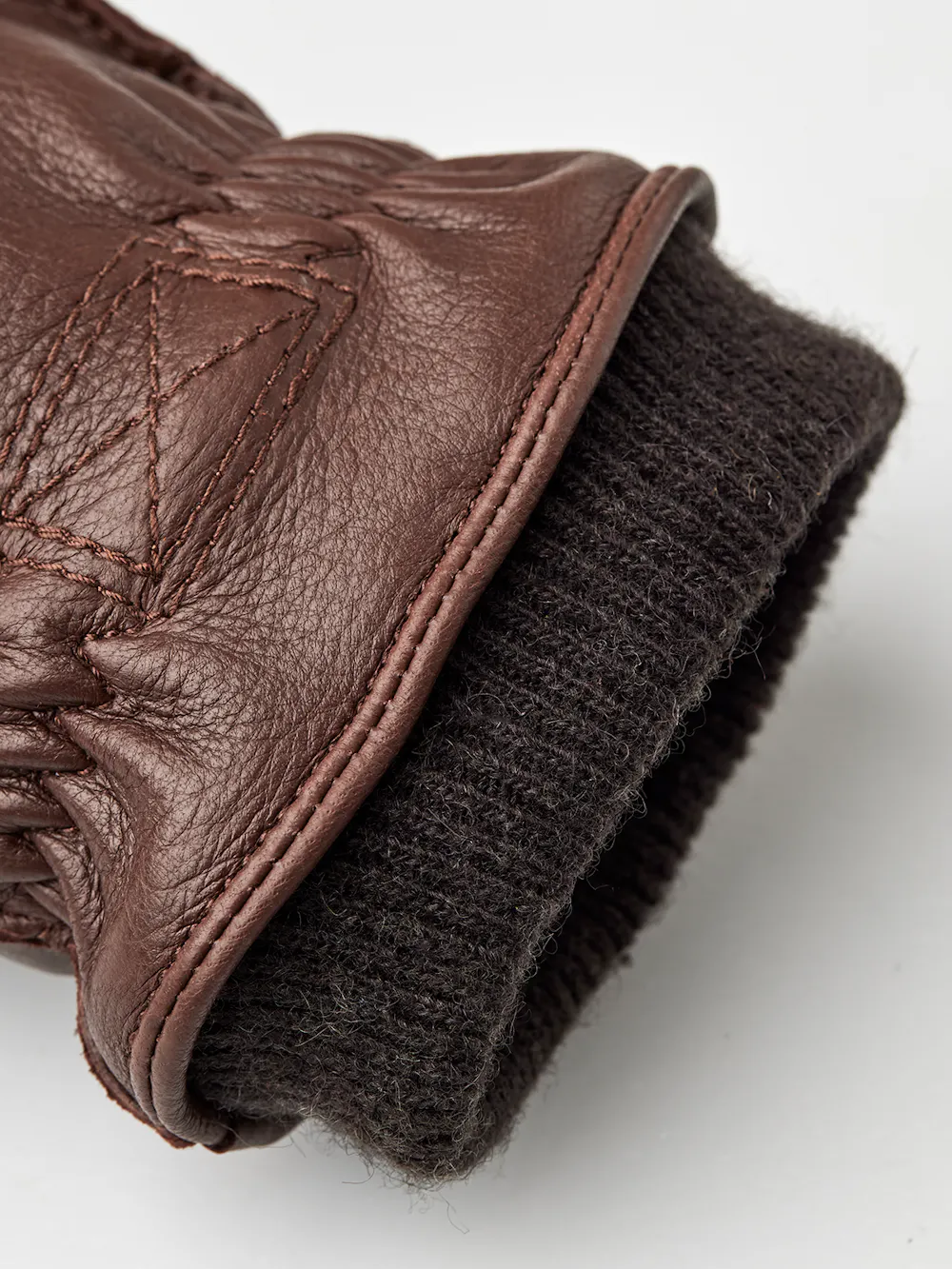 Brown machine-sewn deerskin glove with knitted cuff
 (3 of 3)