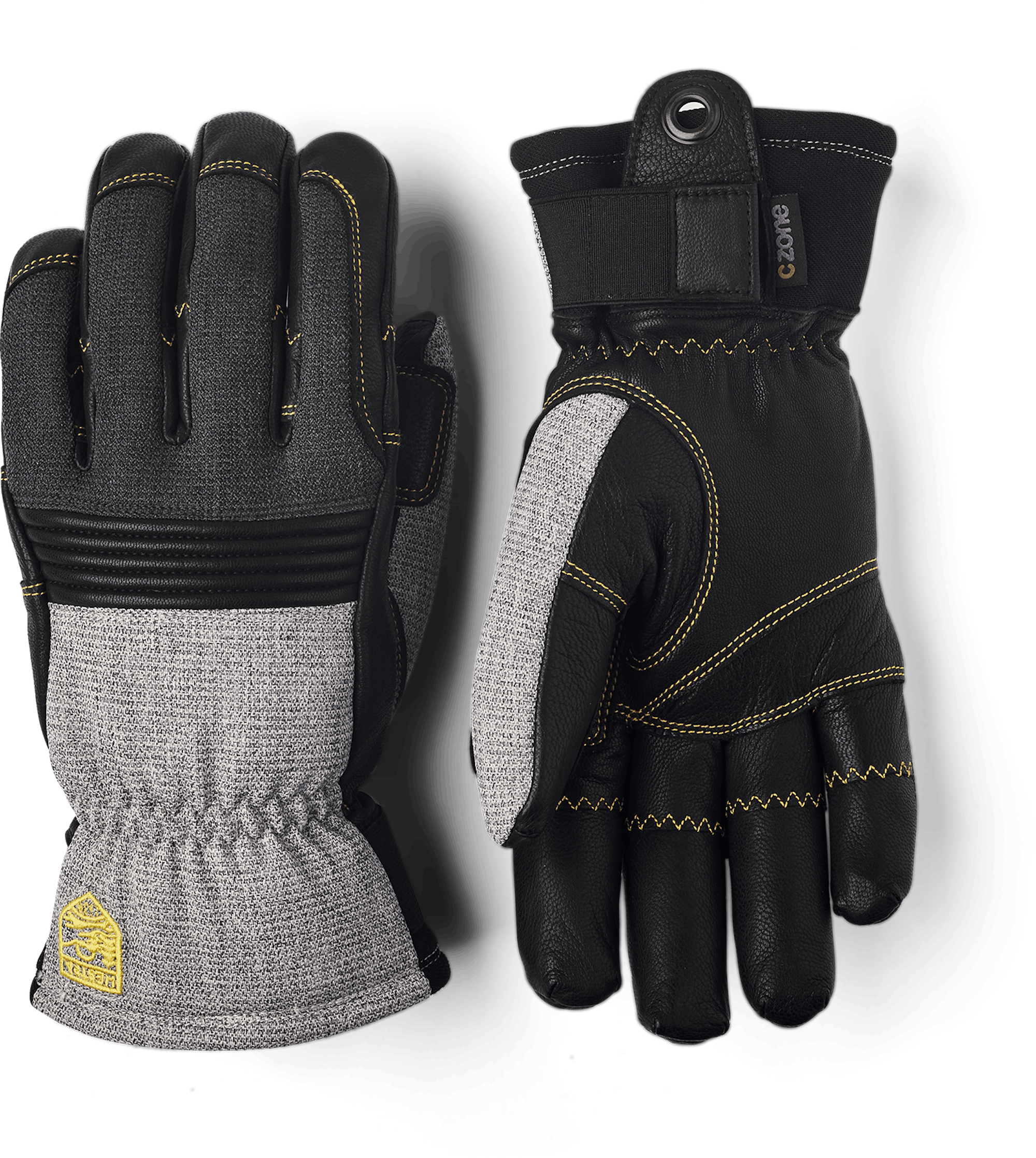 Grå skidhandske i nötnappa med svart getskinn i innerhanden
 (1 av 7)