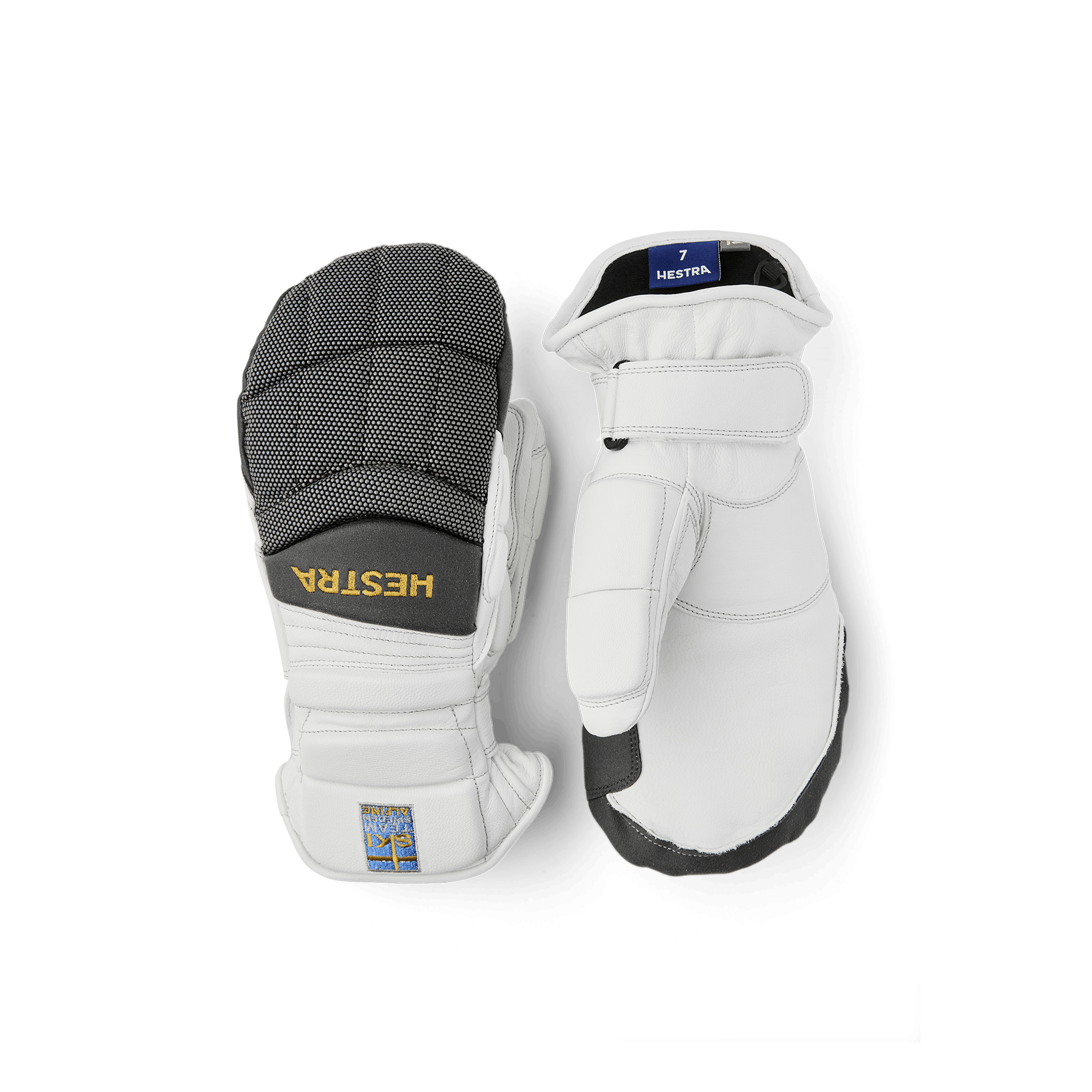 Vit och grå tumhandske i getskinn
(1 av 5)