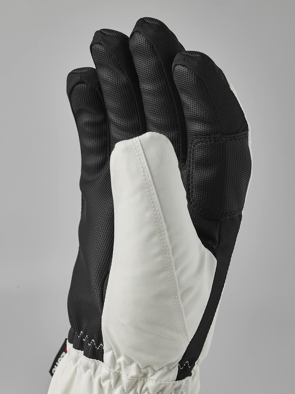 White fabric ski glove with black synthetic palm (3 of 6)