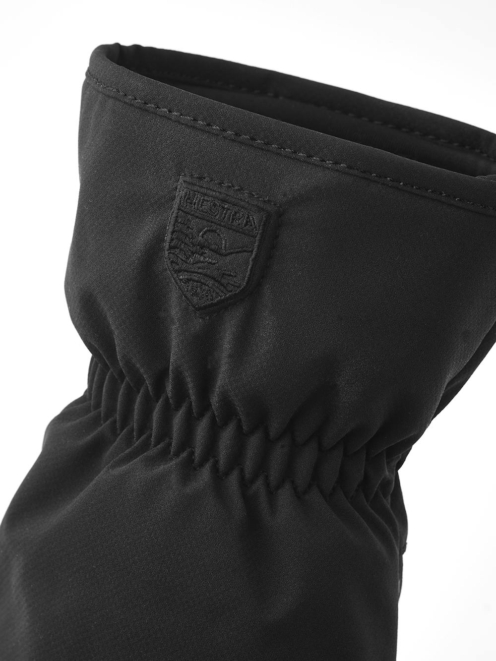 Schwarzer Fausthandschuh aus Stoff (5 oder 6)