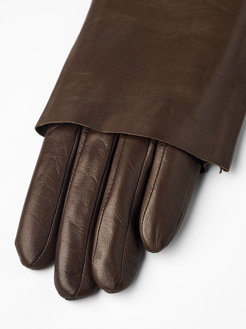 Light brown machine-sewn leather glove with folded ‘cape’
 (2 of 5)