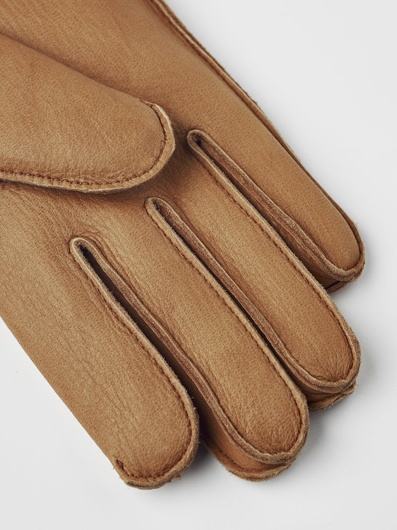 Light brown machine-sewn deerskin glove with light beige extended wool lining
 (9 of 10)
