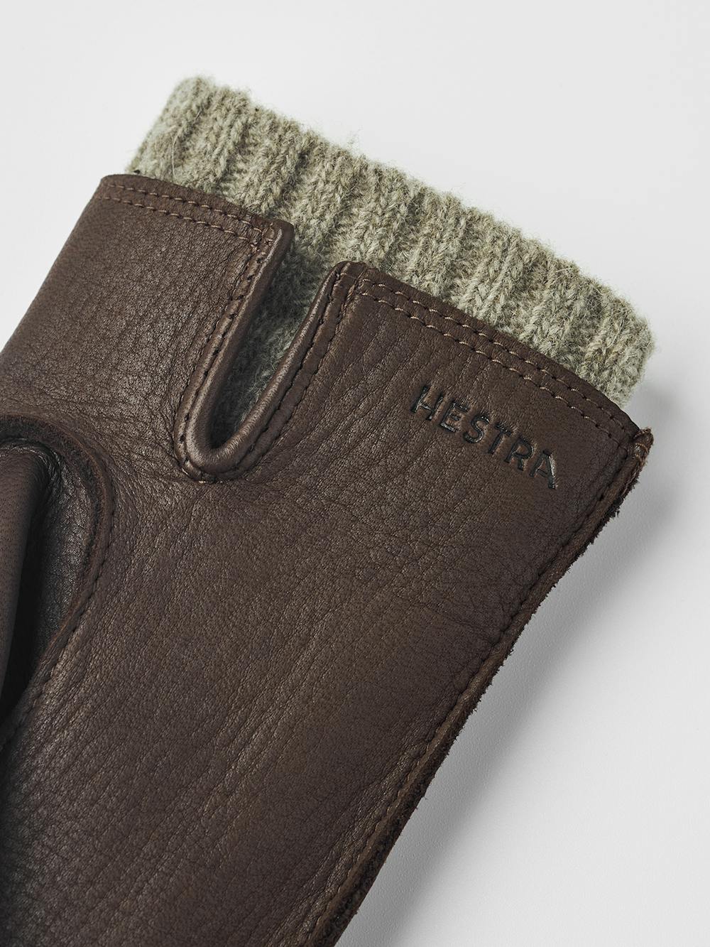 Brauner maschinengenähter Lederhandschuh aus Hirschleder mit beigem verlängertem Wollfutter
(4 oder 5)