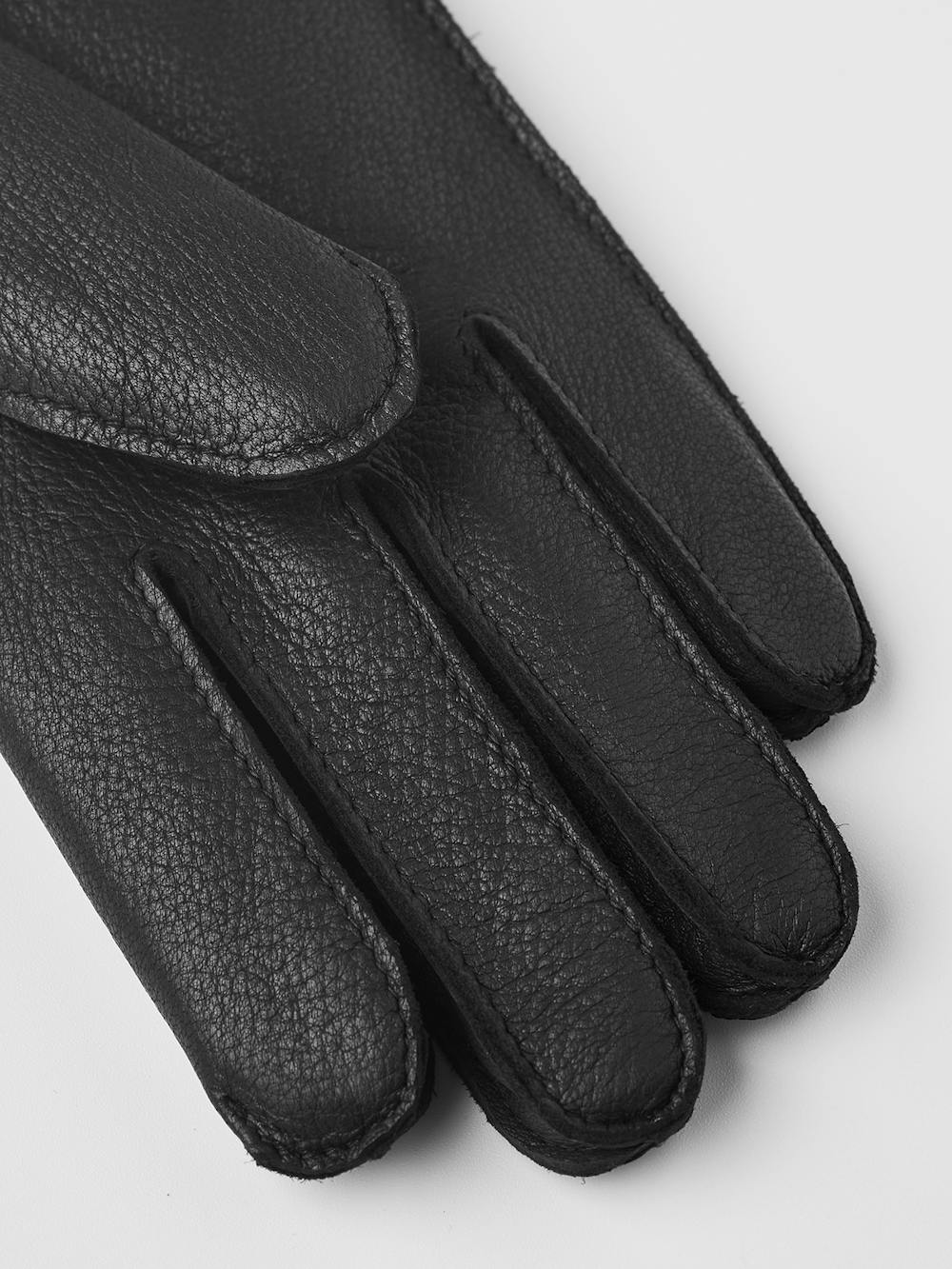 Black machine-sewn deerskin glove with extended wool lining
 (5 of 5)